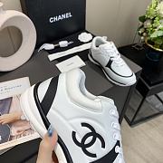 Chanel Women's Black and White Low Top Logo Sneaker - 5