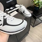 Chanel Women's Black and White Low Top Logo Sneaker - 4