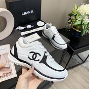 Chanel Women's Black and White Low Top Logo Sneaker - 6