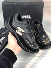 Chanel Low Top Trainer Black and Gold - 2