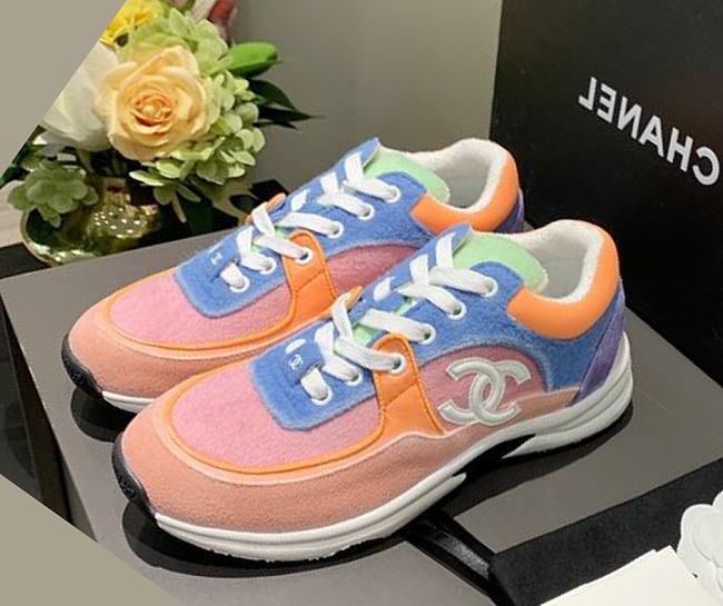 Chanel Women's Orange Low Top Logo Sneaker - 1